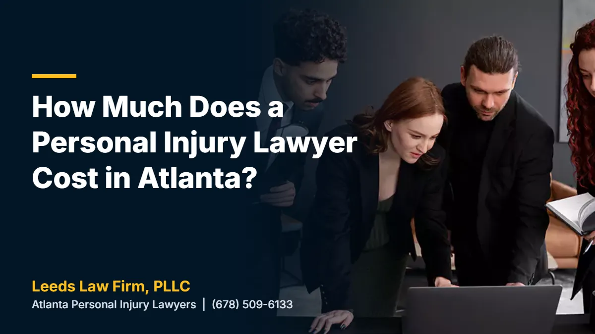 Attorneys reviewing a case together on a laptop